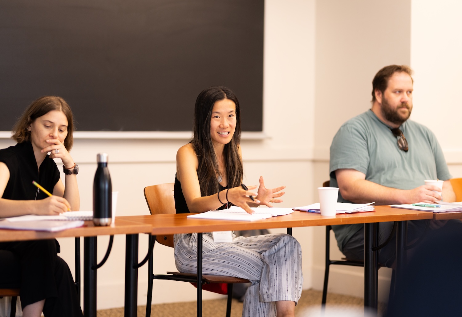 Three faculty members working at a IWT CLASP workshop