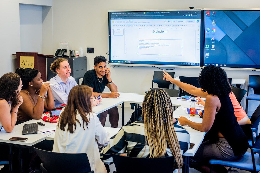 group of students at a round table