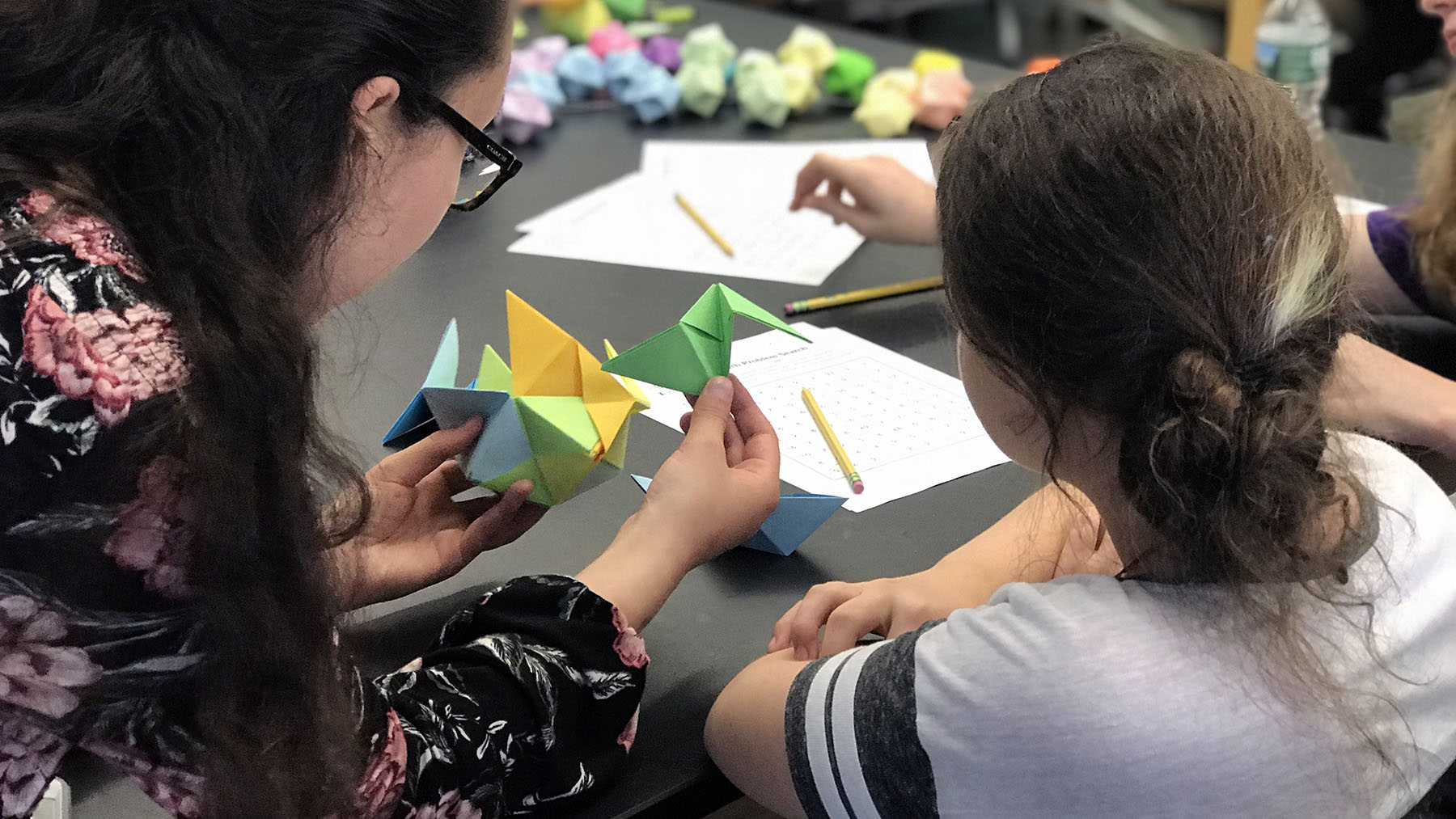 Teacher working with a student