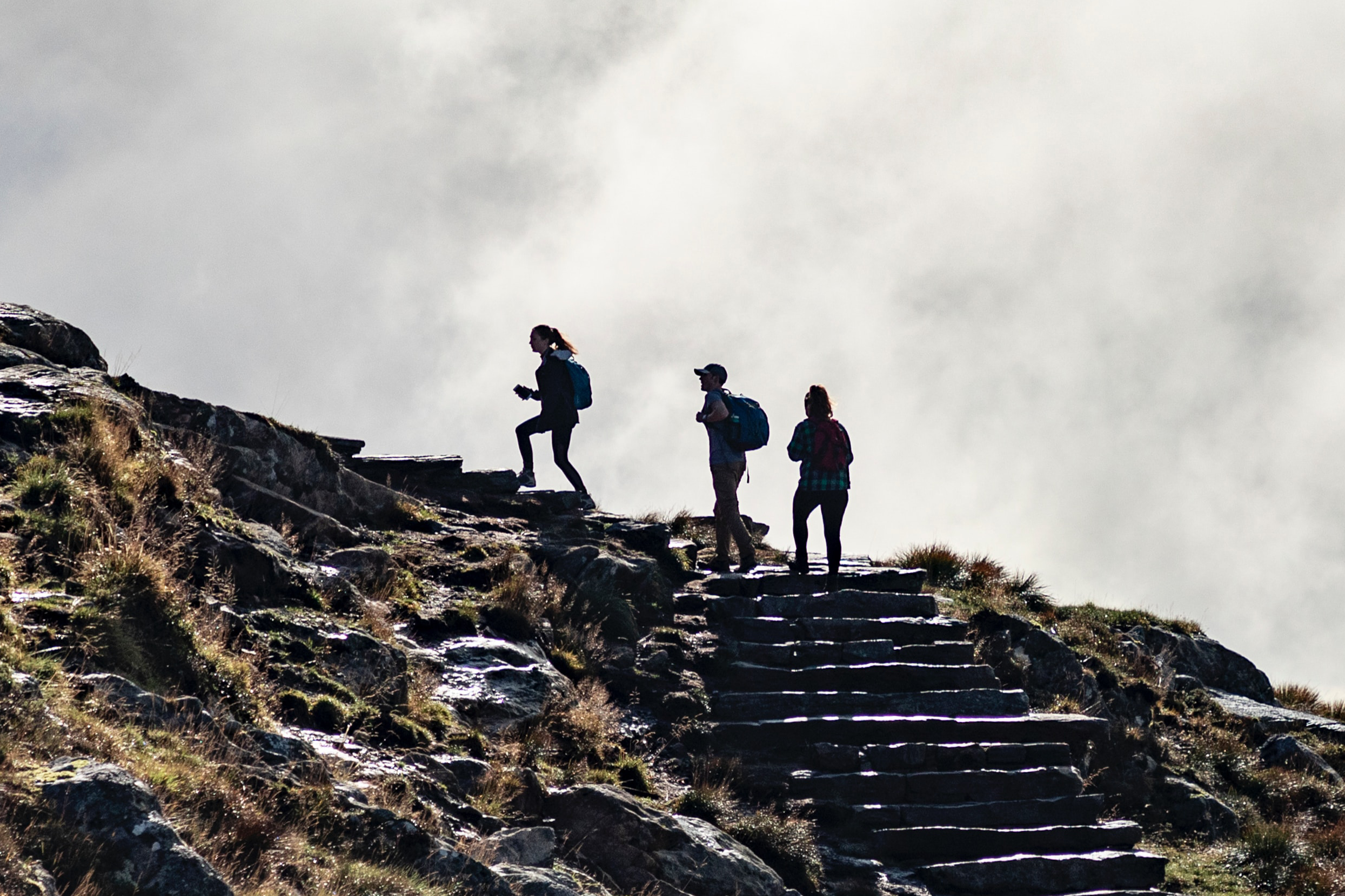 People climbing up a mountain