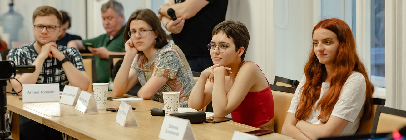 Four students listening
